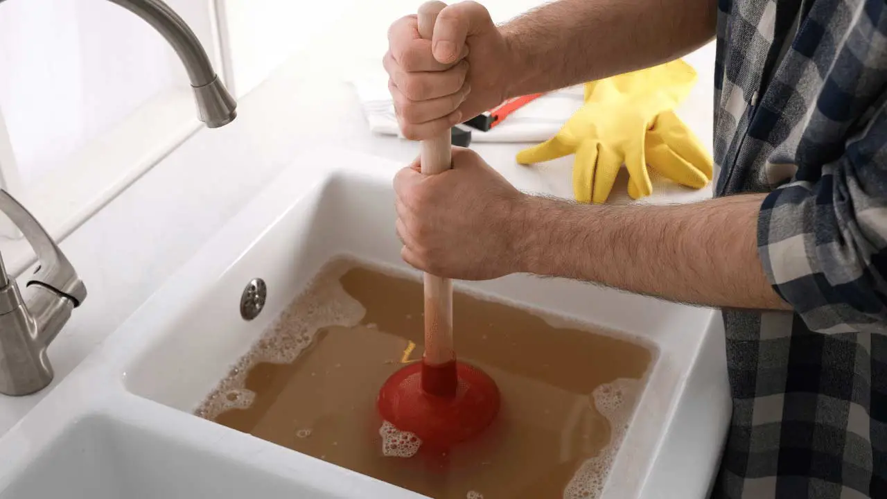 use a plunger to unclog